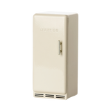 Vintage-style miniature cream fridge with a metal handle, featuring a simple design and embossed MAILEG text, evokes a nostalgic charm.