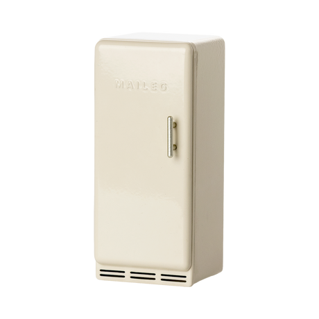 Vintage-style miniature cream fridge with a metal handle, featuring a simple design and embossed MAILEG text, evokes a nostalgic charm.