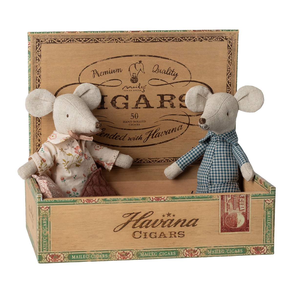 Two fabric mice in vintage clothes sit inside an open wooden cigar box labeled "Havana Cigars." The scene is playful and nostalgic.