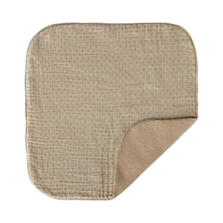 A beige, square sherpa burp cloth with a subtle grid pattern lies on a white background. One corner is folded, showing a fluffy inner lining.