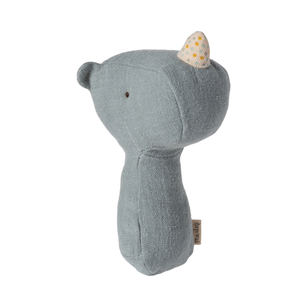 A soft plush rhino baby rattle in a gentle dusty blue color, designed to soothe and entertain little ones.