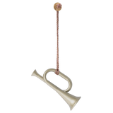 A decorative brass horn pendant hangs from a braided cord, featuring a small metallic button at the top.