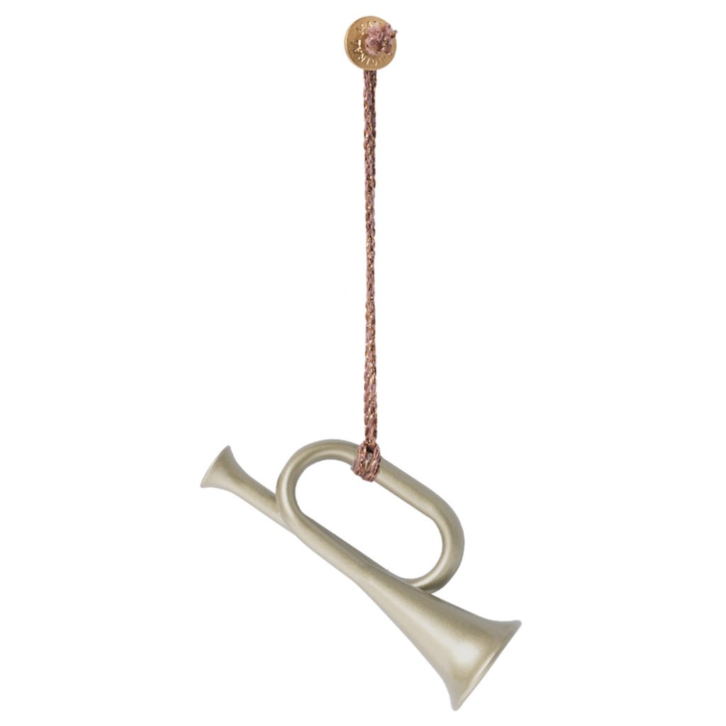 A decorative brass horn pendant hangs from a braided cord, featuring a small metallic button at the top.