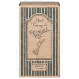 A decorative kraft box featuring a vintage-inspired illustration of a trumpet and greenery, labeled "Noel Trumpet" by Maileg.