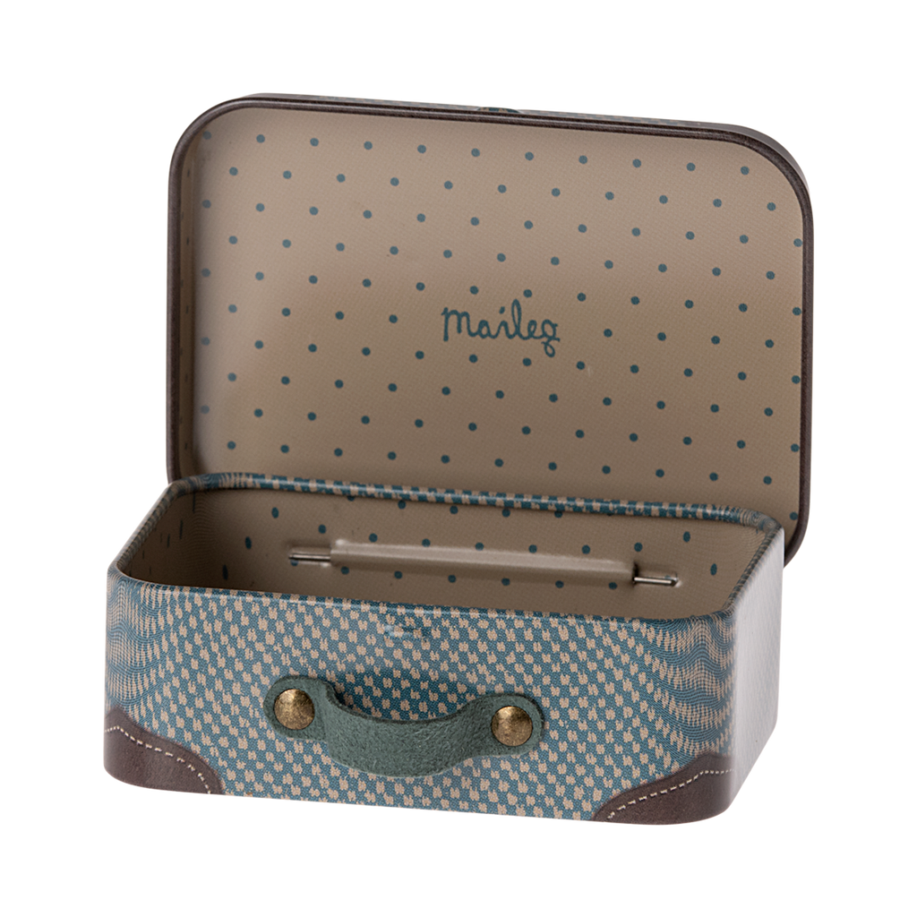 Open vintage-style mini suitcase with a blue and beige pattern. The lid has blue polka dots and "Maileg" written in script, placed against a white background.