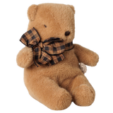 Maileg mini teddy bear plush toy in mushroom brown with a dark plaid ribbon bow.