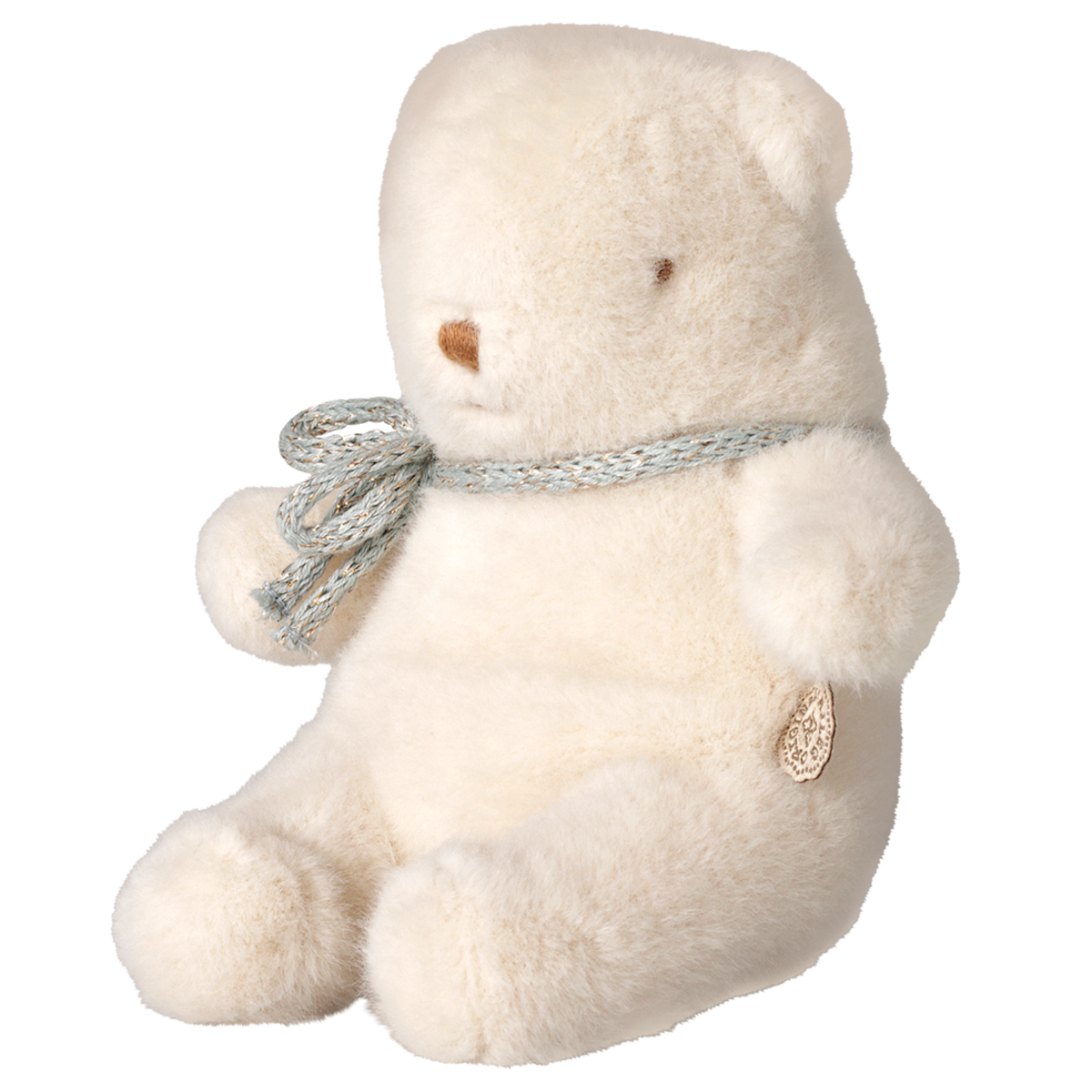 Maileg mini teddy bear plush toy in off-white sitting in a side profile view with a ribbon bow.