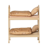 Maileg miniature dollhouse bunk bed in wheat with floral and plaid bedding.