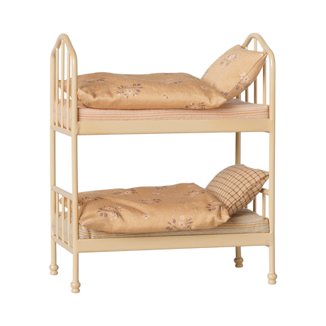 Maileg miniature dollhouse bunk bed in wheat color with floral and plaid bedding set.