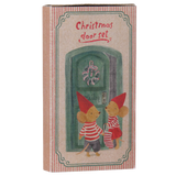 Maileg mouse Christmas door set packaging with an illustration of two festive mice by a green door.
