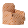 Maileg dollhouse miniature armchair in a tan polka dot fabric.