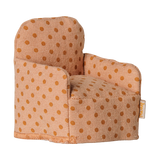 Maileg dollhouse miniature armchair in a tan polka dot fabric.