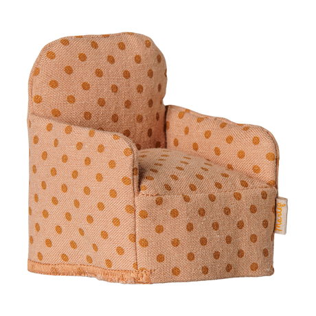 Maileg dollhouse miniature armchair in a tan polka dot fabric.