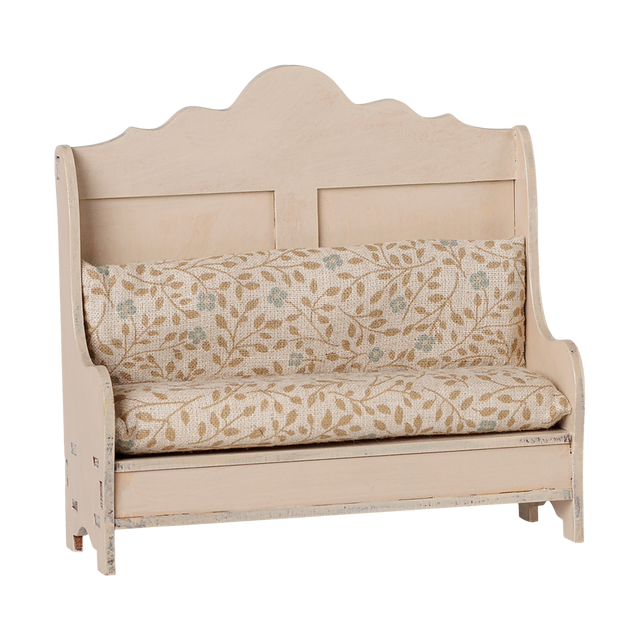 Maileg miniature kitchen bench in light sand with floral pattern cushions.