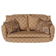 Maileg miniature dollhouse sofa bed in ocher with floral patterned pillows.