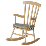 Maileg miniature dollhouse rocking chair in wheat with a patterned seat cushion.