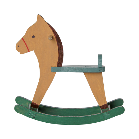 Maileg miniature light brown and green wooden rocking horse toy for mouse dolls.