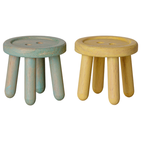 Maileg mouse dollhouse stool set featuring two small wooden button-shaped stools in mint and light yellow.