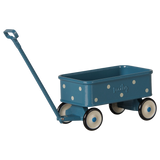 Maileg miniature blue toy wagon with white polka dots and a long pull handle for mouse dolls.