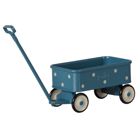 Maileg miniature blue toy wagon with white polka dots and a long pull handle for mouse dolls.