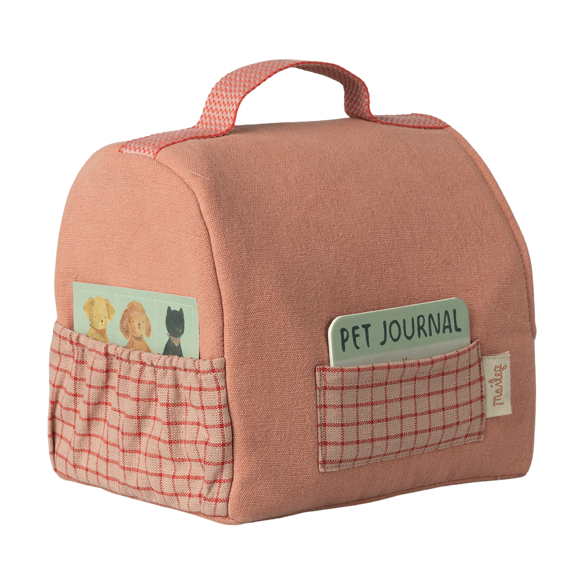 A soft pink fabric bag with a red checkered pocket on each side. One pocket holds a pet-themed card; the other has a "Pet Journal" notebook.