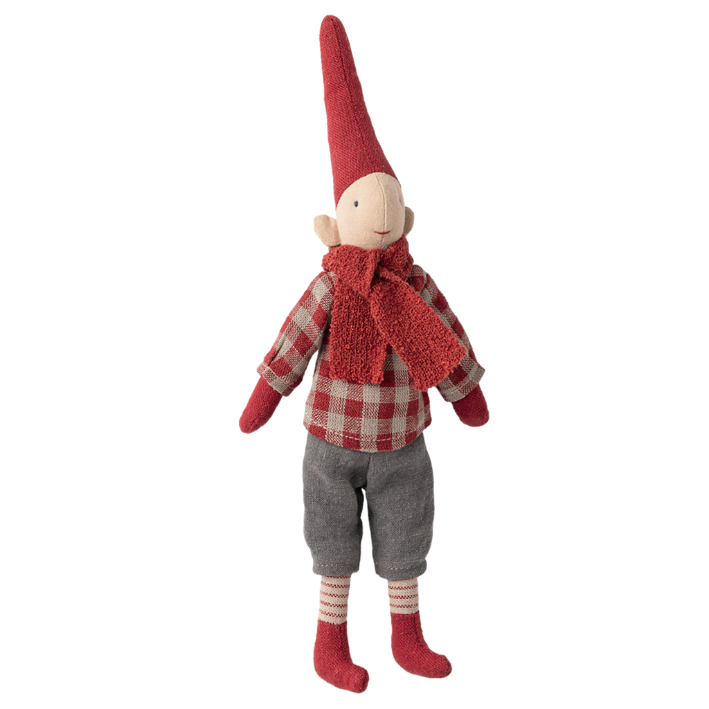 Plush elf doll with a red pointy hat and scarf, wearing a checkered shirt and gray pants. The doll exudes a cozy, festive vibe against a white background.