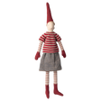 A whimsical stuffed doll wearing a red striped shirt, grey skirt, and tall pointed hat, with red mittens and socks, against a white background.