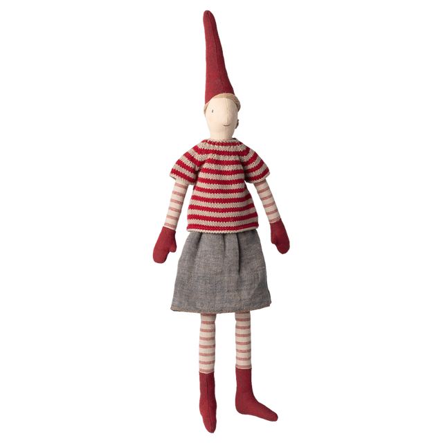 A whimsical stuffed doll wearing a red striped shirt, grey skirt, and tall pointed hat, with red mittens and socks, against a white background.