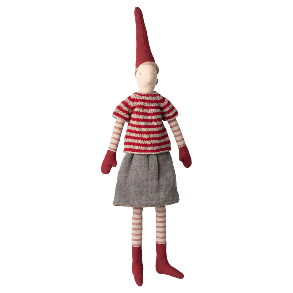 A whimsical stuffed doll wearing a red striped shirt, grey skirt, and tall pointed hat, with red mittens and socks, against a white background.