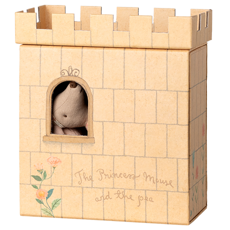 A cardboard castle with a toy mouse peeking through a window. The castle is beige with decorative flowers and the text "The Princess Mouse and the Pea."