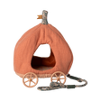 Fabric toy shaped like an orange pumpkin carriage with four wooden wheels and a floral-patterned pull string, creating a whimsical, fairy-tale feel.