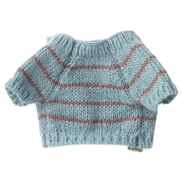 Light blue, hand-knitted doll sweater with brown stripes and short sleeves on a white background. Warm, cozy appearance reflects a handmade charm.