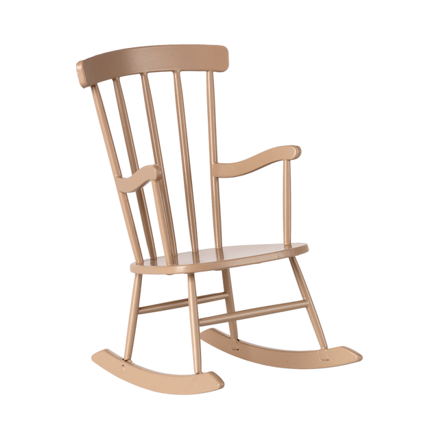 A light brown miniature wooden rocking chair with vertical slats on the backrest and curved armrests. It sits in a minimalist style on a white background.