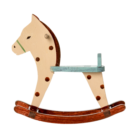 A charming miniature wooden rocking horse with a spotted pattern—sized perfectly for Maileg mice, ideal for dollhouse play and vintage-style nursery scenes.