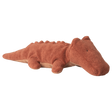 A soft, brown plush crocodile toy with a textured surface and small limbs, lying on a white background. The toy conveys a calm, friendly demeanor.