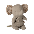 A soft, beige elephant plush with patterned ears featuring leaf designs. The toy has a simple, minimalist look, conveying a calm, cozy vibe.