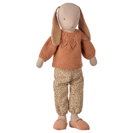 Maileg size 3 classic bunny doll wearing a coral knitted sweater and floral pants.