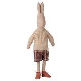 Maileg size 4 classic rabbit plush toy wearing a knitted sweater, plaid shorts, and brown shoes.