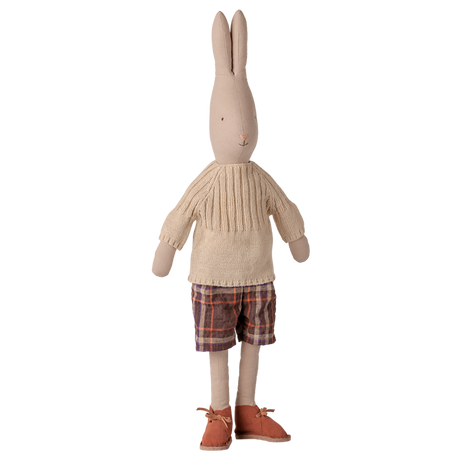 Maileg size 4 classic rabbit plush toy wearing a knitted sweater, plaid shorts, and brown shoes.