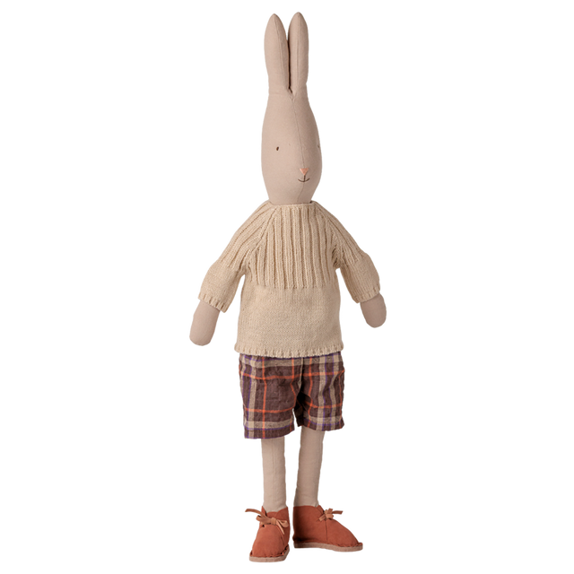 Maileg size 4 classic rabbit plush toy wearing a knitted sweater, plaid shorts, and brown shoes.