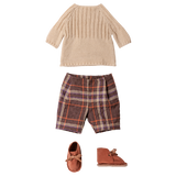 Maileg size 4 doll clothes set with off-white knitted sweater, plaid shorts, and brown shoes.