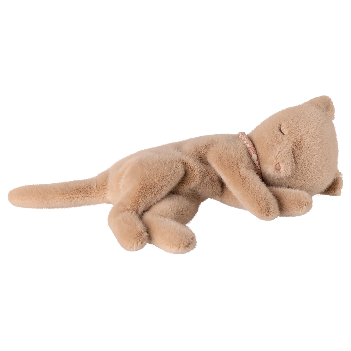 A plush, light brown toy cat lies peacefully on its side against a white background. Its eyes are closed, conveying a sense of calm and relaxation.