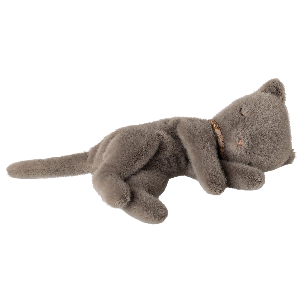 A plush gray cat toy lies peacefully asleep against a white background, with a golden collar. The toy is soft, with its eyes gently closed.