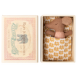 Toy mouse in a matchbox bed with a polka dot shirt and patterned blanket. Box lid reads "Baby Jumbo Matches" with an elephant illustration.