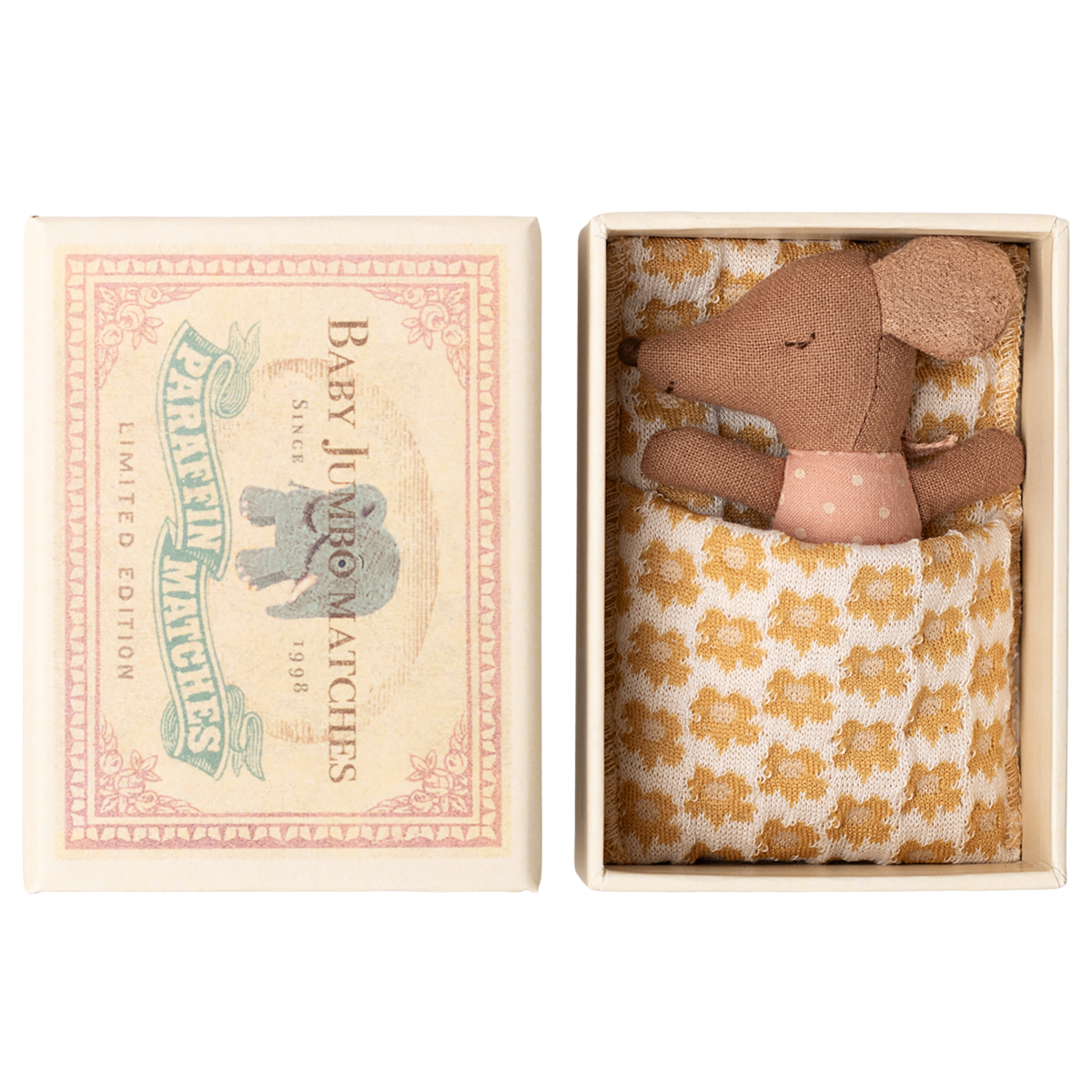 Toy mouse in a matchbox bed with a polka dot shirt and patterned blanket. Box lid reads "Baby Jumbo Matches" with an elephant illustration.