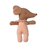 A cute fabric mouse toy with large ears wearing a pink polka dot outfit and bow tie, set against a white background, creating a charming and playful tone.