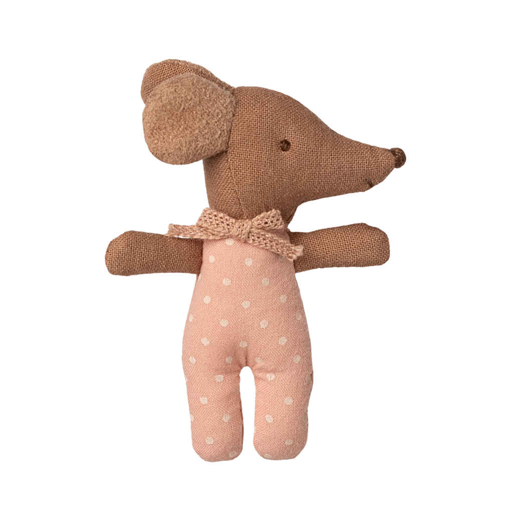 A cute fabric mouse toy with large ears wearing a pink polka dot outfit and bow tie, set against a white background, creating a charming and playful tone.