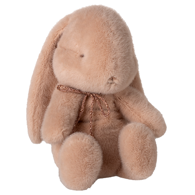 Maileg small bunny plush in powder pink with a rose gold bow and floppy ears on a white background.