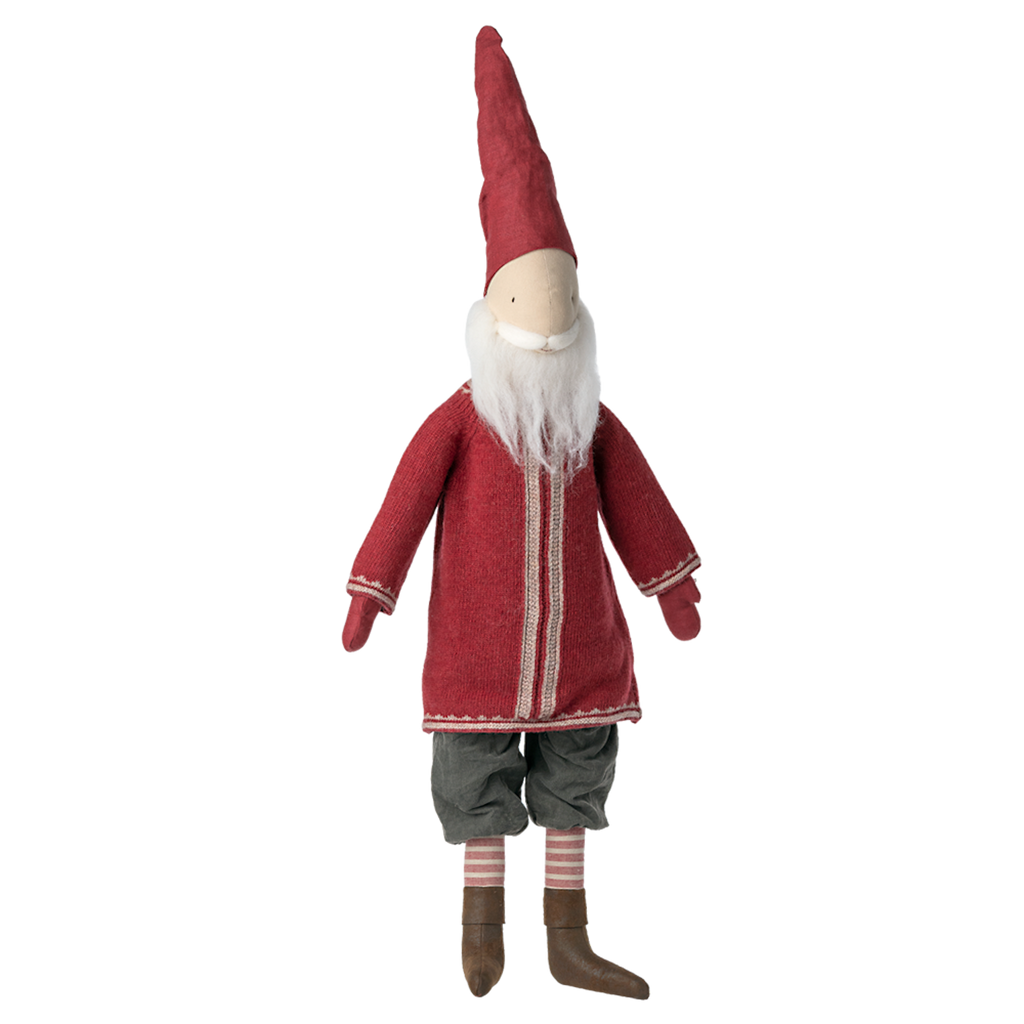Whimsical fabric gnome with a long white beard, red pointy hat, and coat. Gray pants, pink striped socks, and brown shoes. White background.