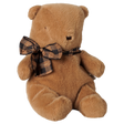 Maileg small teddy bear plush toy in mushroom brown with a plaid bow tie, sitting profile view.